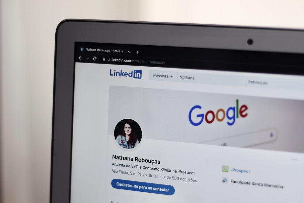 A LinkedIn profile on a laptop screen