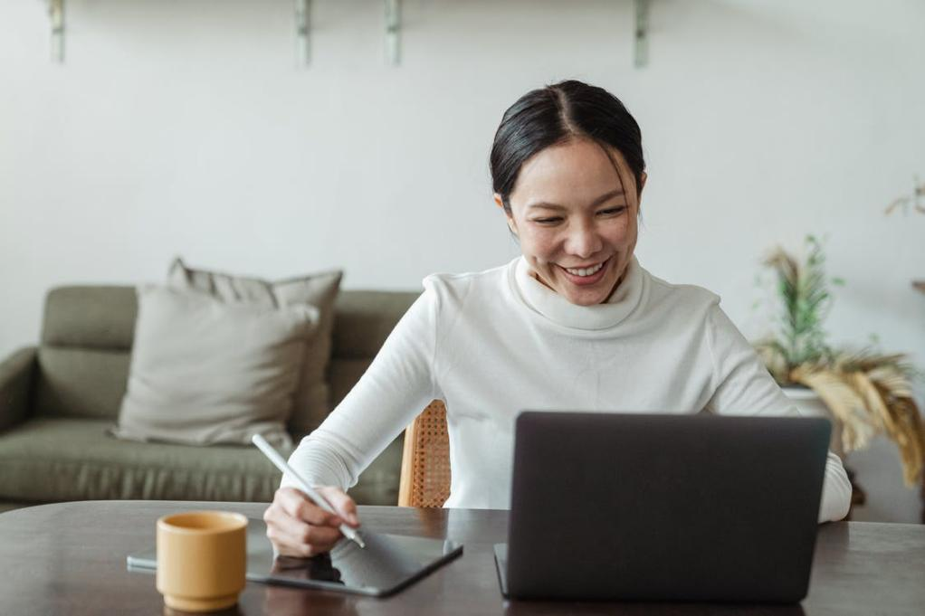 a woman getting an interview after her resume was accepted