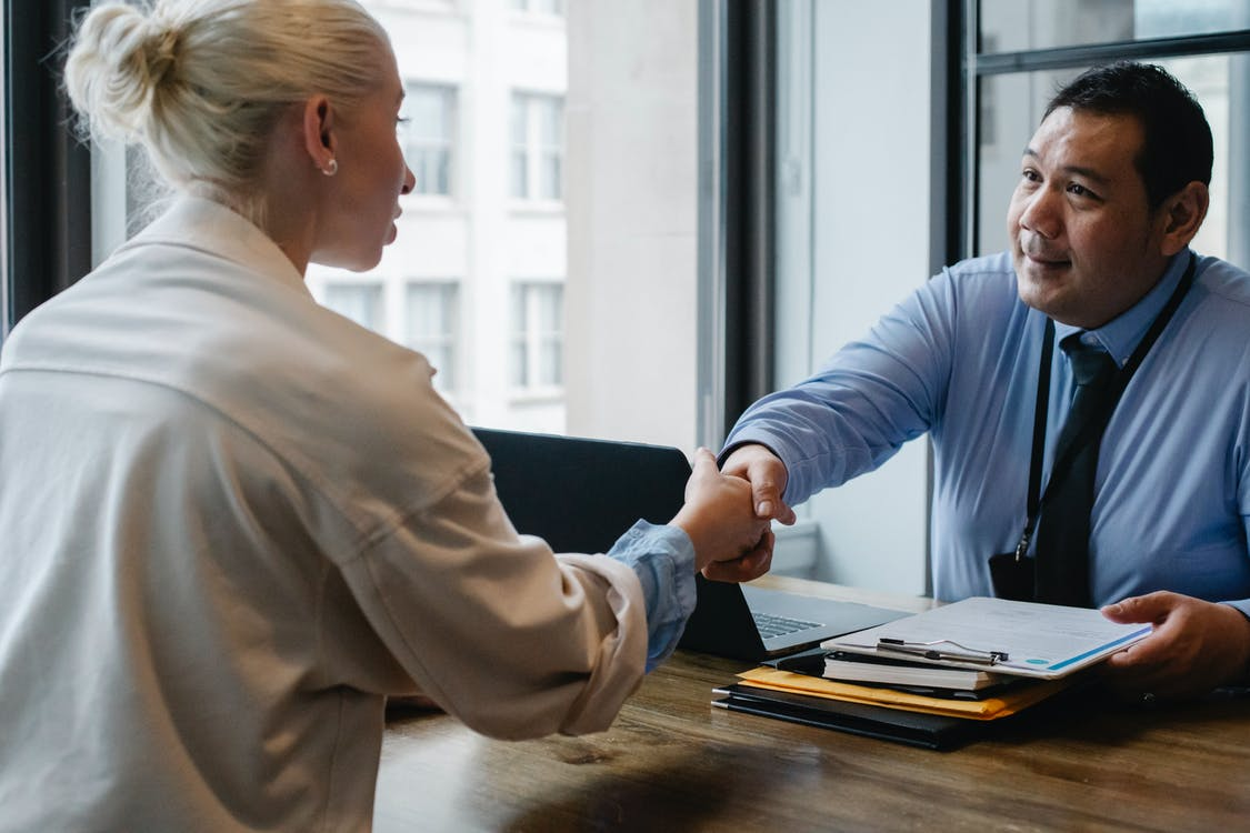 Employer shaking applicant's hand