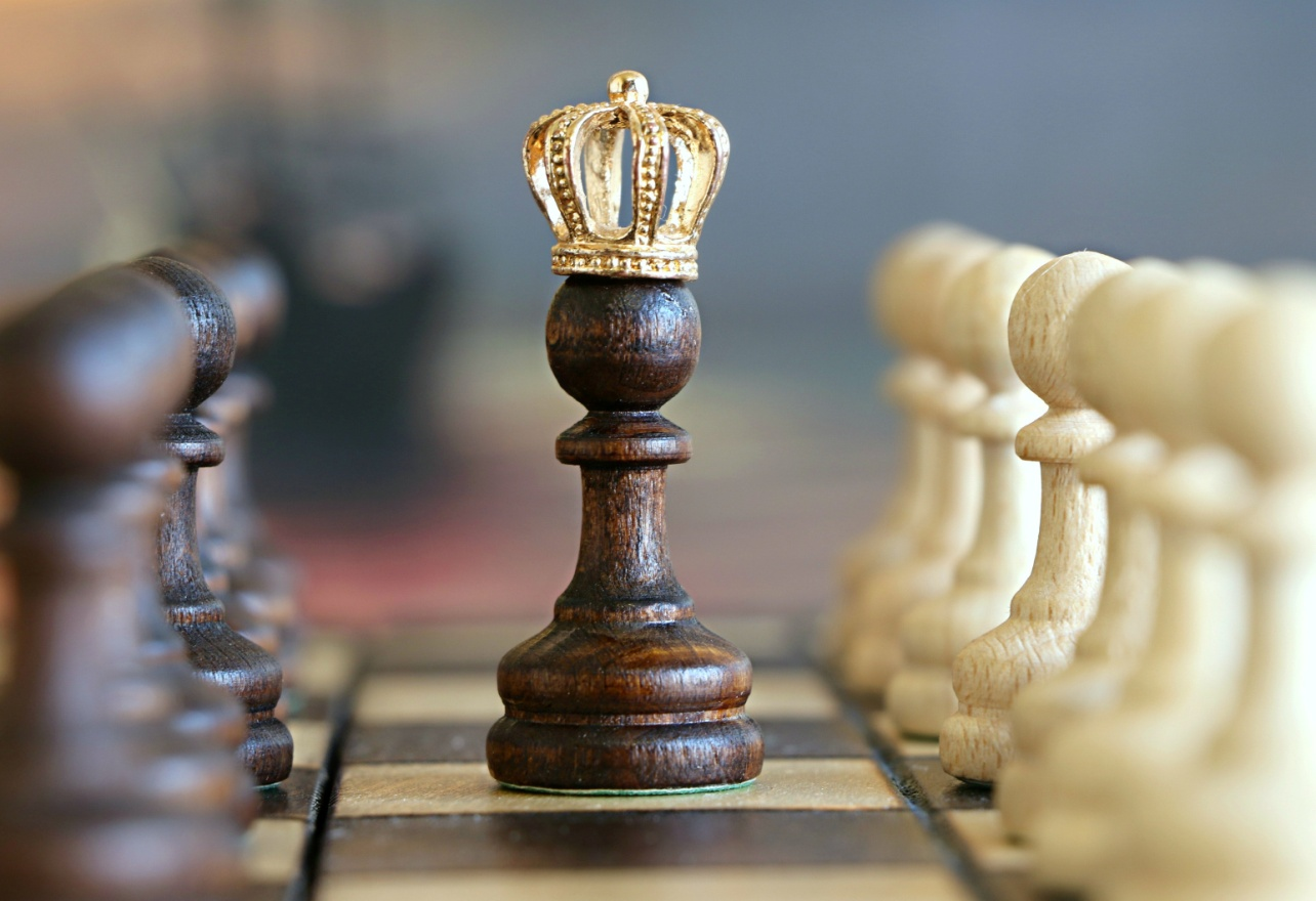 Chess pieces with a crown